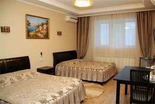 Гостиница Лазурный берег Тюмень Четырехместный номер «Комфорт»-5